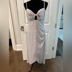 White sundress dress with black and orange flowers